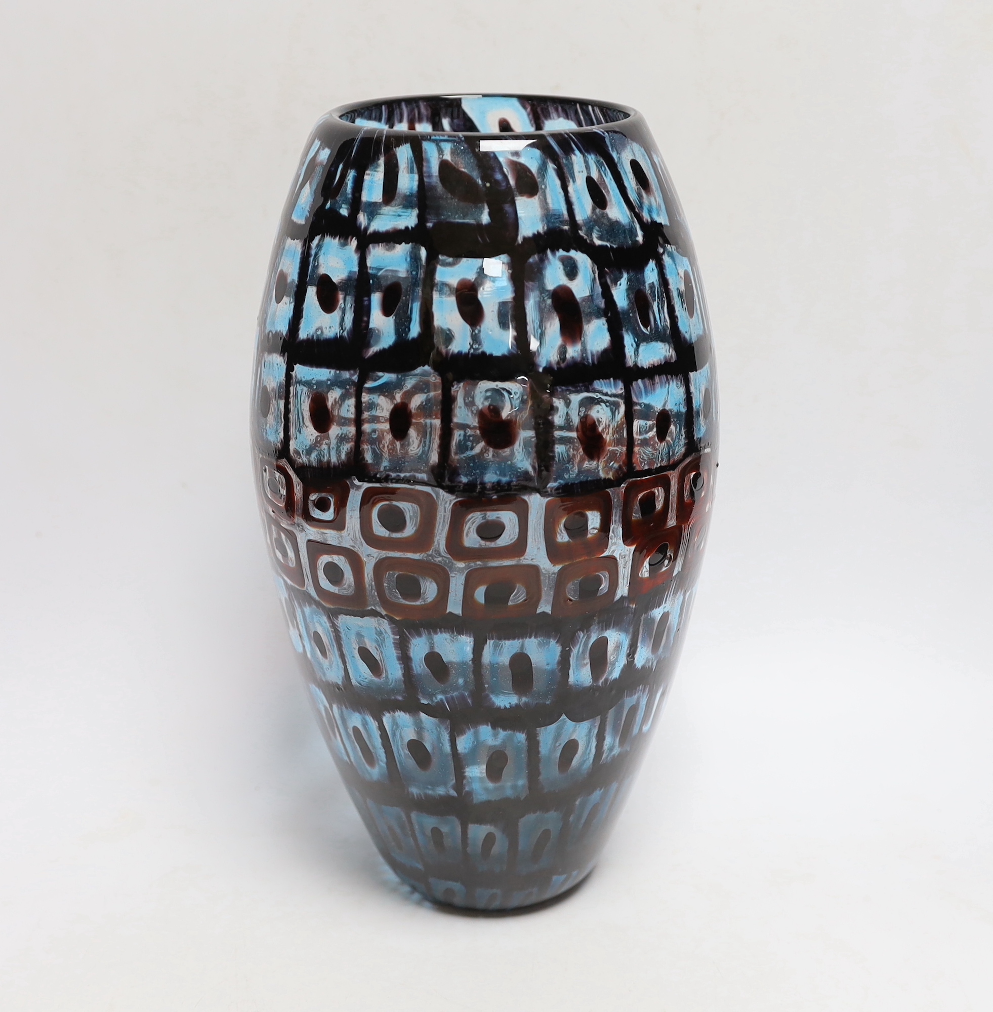 Vittorio Ferro (1932-2012) A Murano glass Murrine vase, ovoid shaped, with bands of squares in blue and red, unsigned, 29cm, Please note this lot attracts an additional import tax of 20% on the hammer price